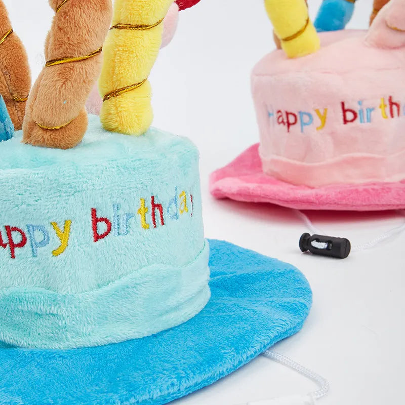 Blue and pink toy dog birthday hats showing 21cm width dimensions on plush animal