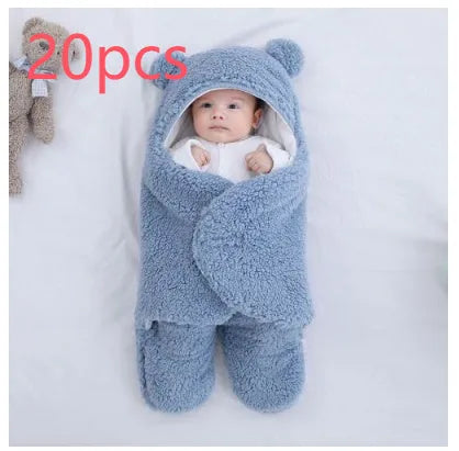 Baby quilted sleeping bag wrapper in cotton blend fabric with polyester cotton filling, shown in one of six colours