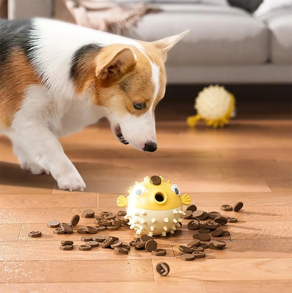 Green fish-shaped interactive dog toy with textured surface for dental cleaning