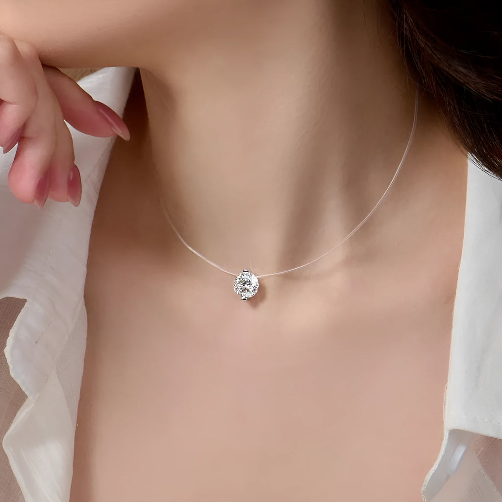 Women's S925 silver moissanite pendant necklace with invisible fishing line chain on clavicle.