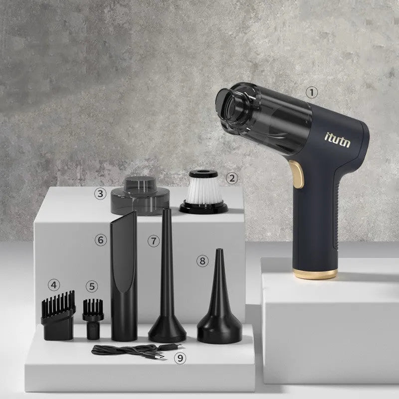 Black wireless car vacuum cleaner with multiple nozzle attachments including brush heads and suction tubes