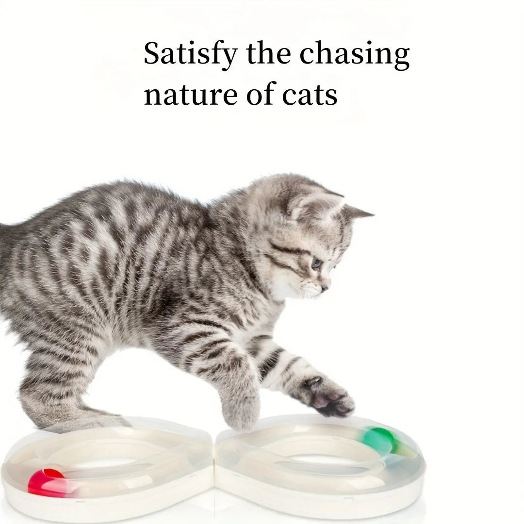 Blue cat turntable toy with rotating ball track and feather teaser wand on floor
