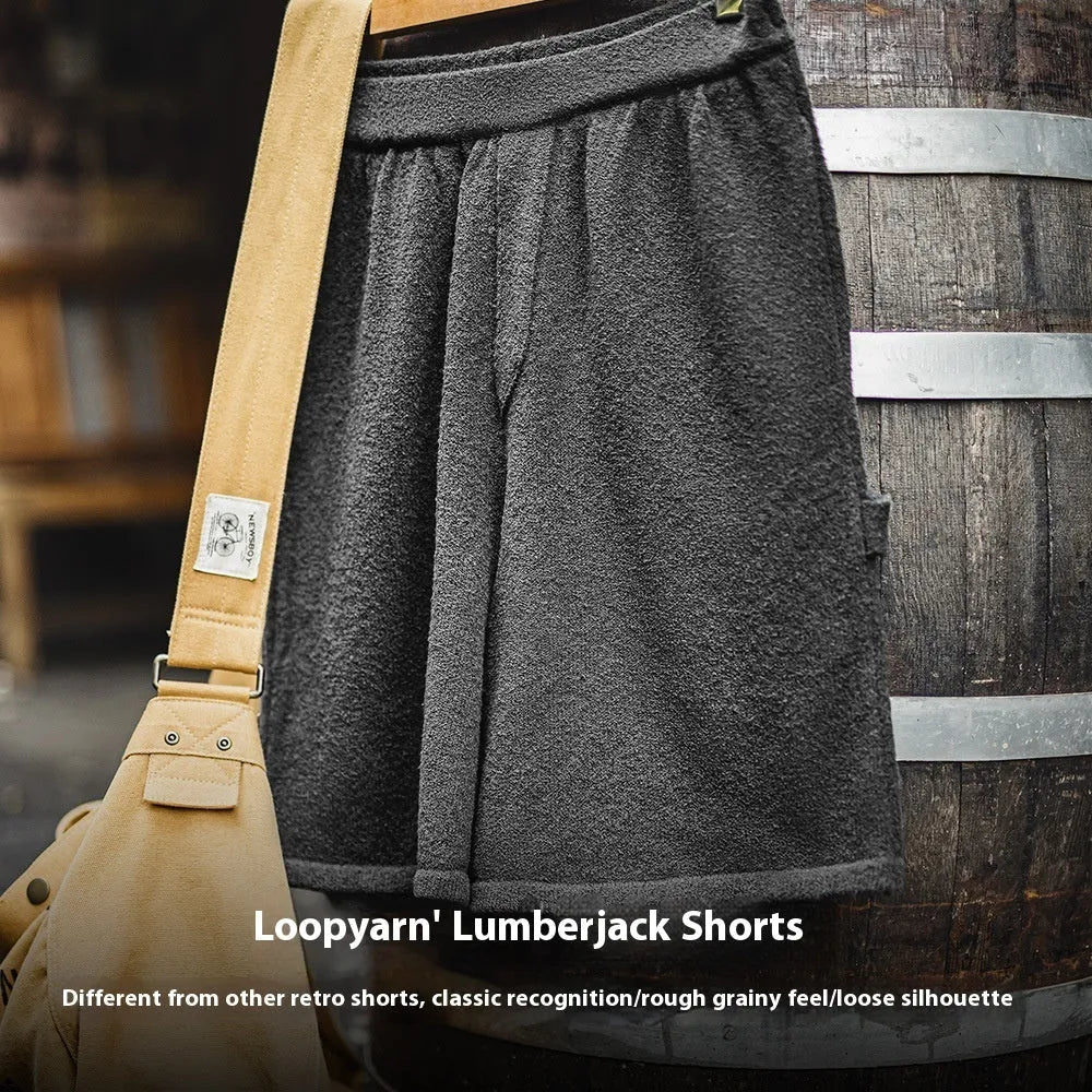 Cement grey polyester sports shorts with straight cut and elastic waistband