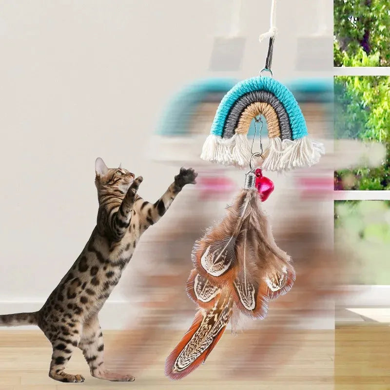 Blue feather rope cat toy with elastic cord hanging from door with sticky buckle clamp