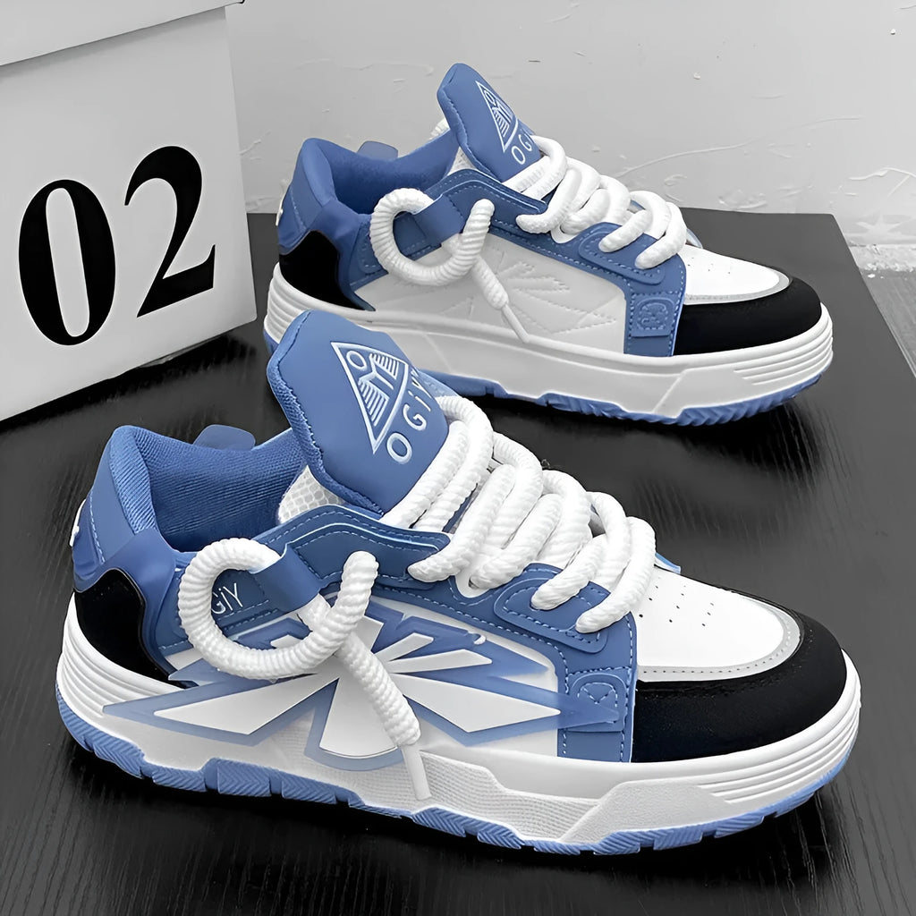 Men's white chunky platform sneakers with thick rubber sole and cartoon pattern on synthetic leather upper.