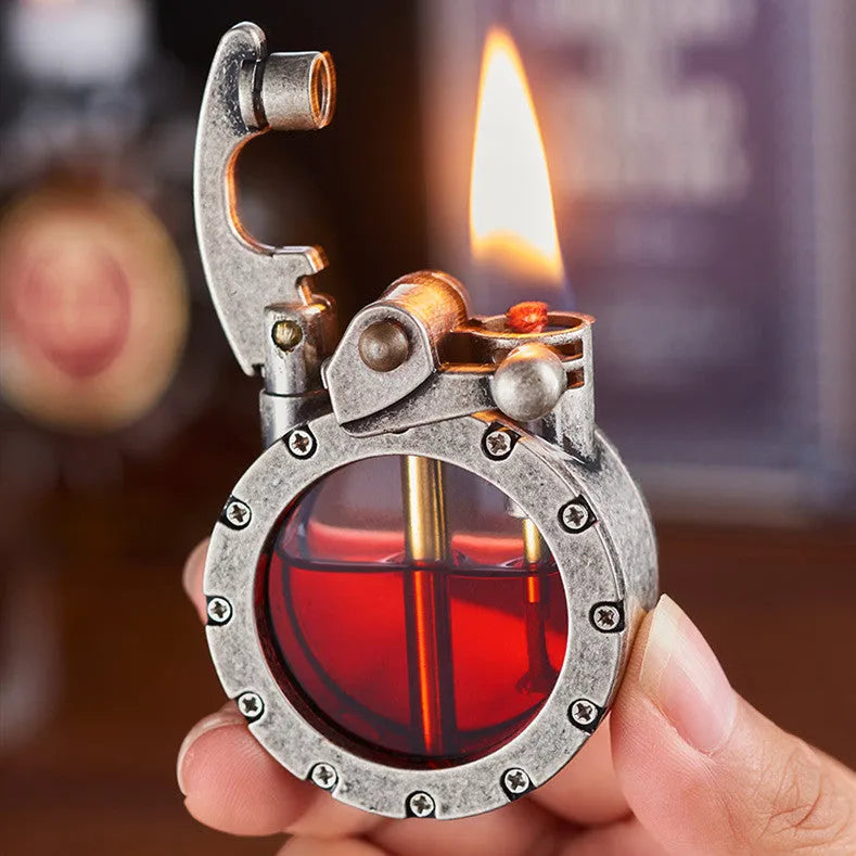 Metal rocker arm kerosene lighter with round transparent fuel tank zinc alloy body gold drawing finish