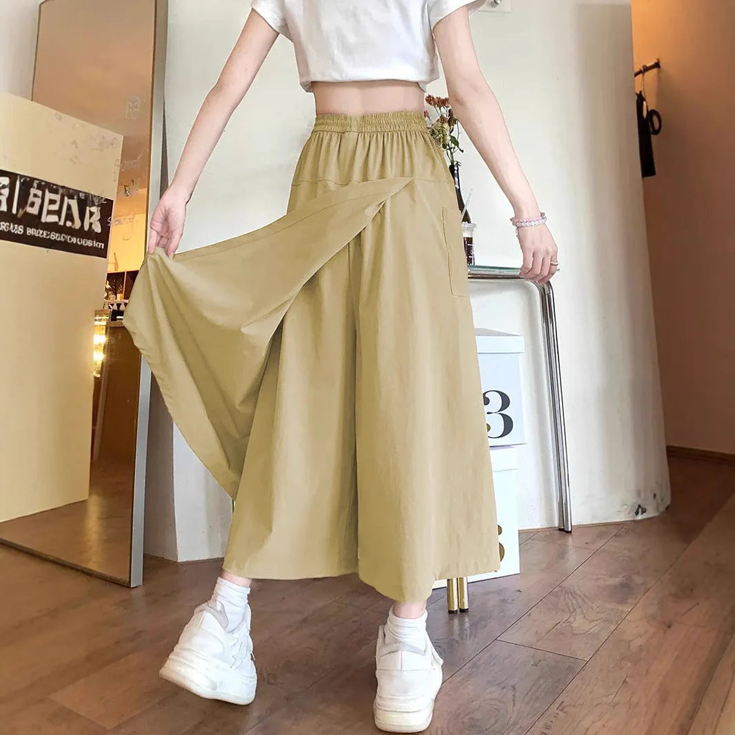 Camel women's casual loose fit a-line skirt with elastic waist on model