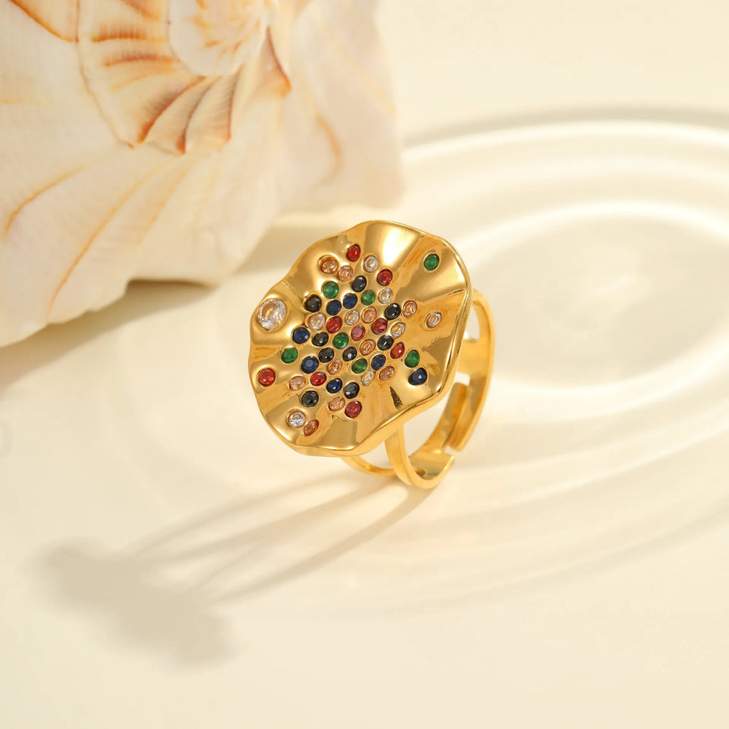 Open mouth geometric stainless steel ring with pleated detailing and colour diamond titanium accents