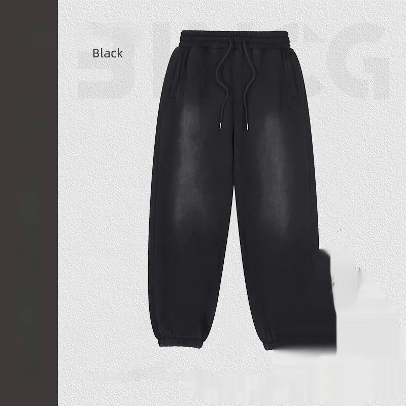 Black men's loose cotton sports sweatpants with wool lining, straight leg style