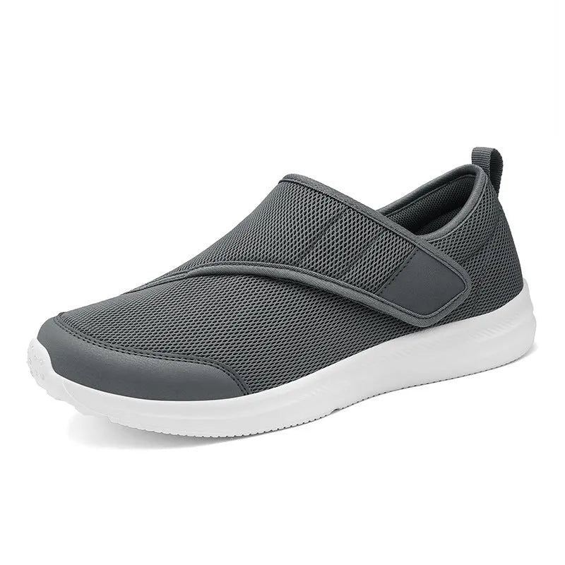 Outdoor mountaineering walking shoes with mesh upper, Velcro closure, and round toe in black