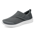 Outdoor mountaineering walking shoes with mesh upper, Velcro closure, and round toe in black