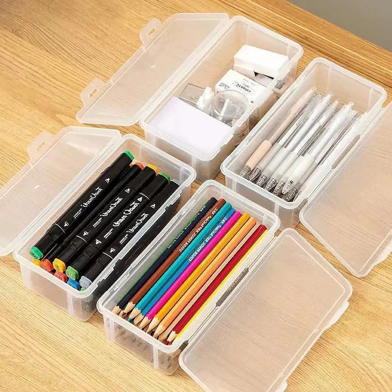 Large transparent plastic stationery storage box filled with colour pencils and crayons.