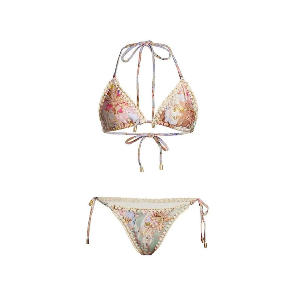 Women's floral print bikini set with skirt in creamy-white beige, shown on a mannequin