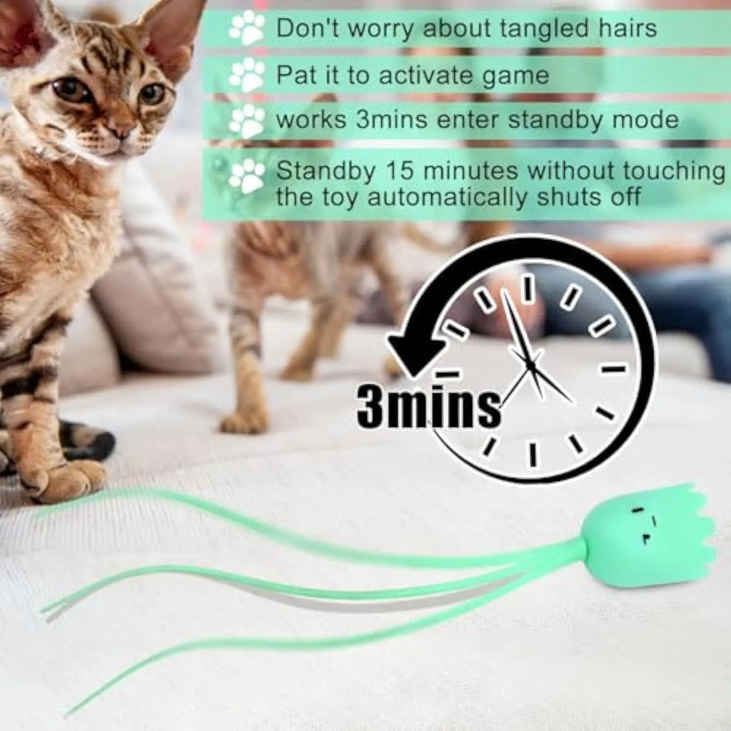 Green automatic cat wand toy with swinging silicone tails for indoor cats on wooden floor