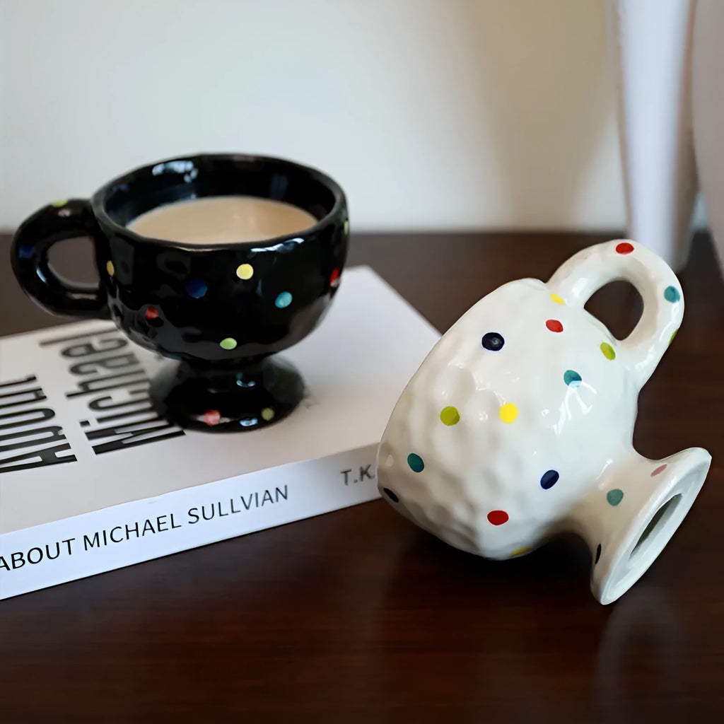Hand-pinched irregular ceramic mug in solid colour with modern simplicity design