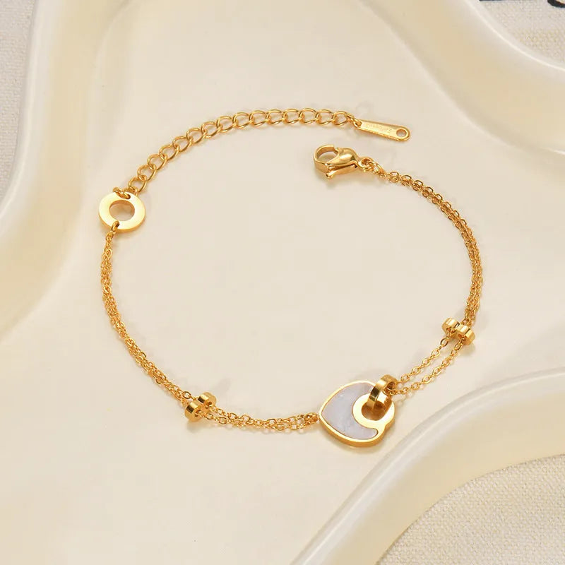 Women's stainless steel resin bracelet with double-layered heart design and electroplating finish