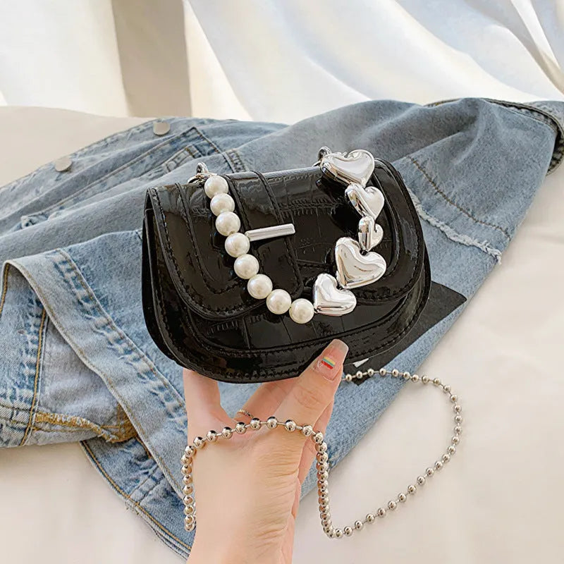 Women's PU leather mini tote crossbody bag showing mobile phone compartment and sandwich pocket