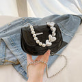 Women's PU leather mini tote crossbody bag showing mobile phone compartment and sandwich pocket