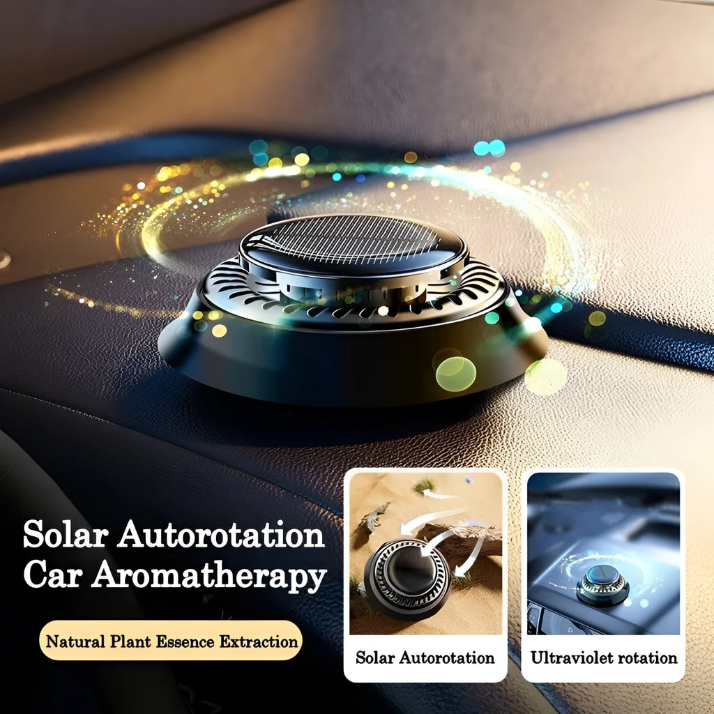 Solar-powered kinetic double ring rotating car air freshener fragrance diffuser on a car dashboard.