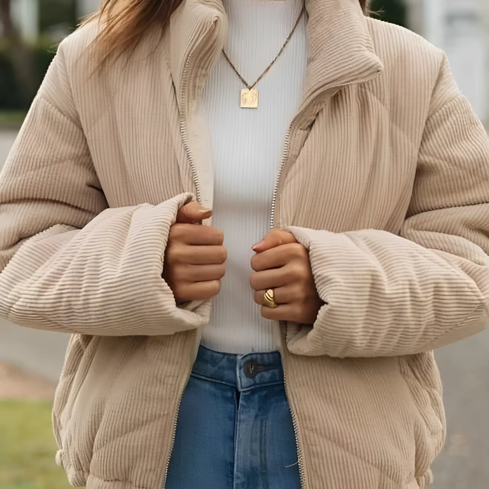 Women's apricot corduroy wadded jacket with stand collar and full-length front zipper showing street fashion styling