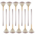 Ten champagne-coloured acrylic handle fan brushes with soft white bristles and clear protective covers.