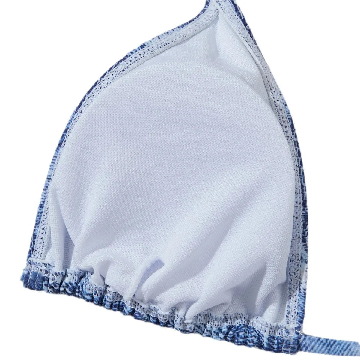 Denim blue printed women's bikini set with strappy triangle top and matching bottoms on a neutral background.