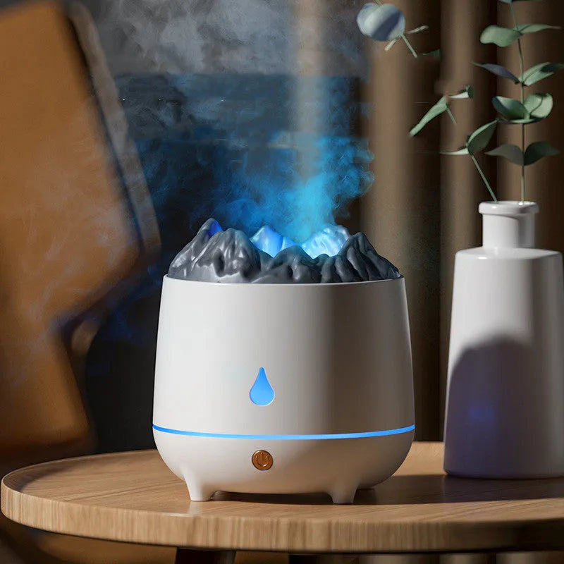 White volcano-shaped ultrasonic humidifier on a wooden desk, USB powered for home fog use