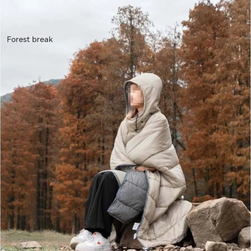 Army Green outdoor cloak sleeping bag worn as a cape, showing its 200cm length and nylon fabric.