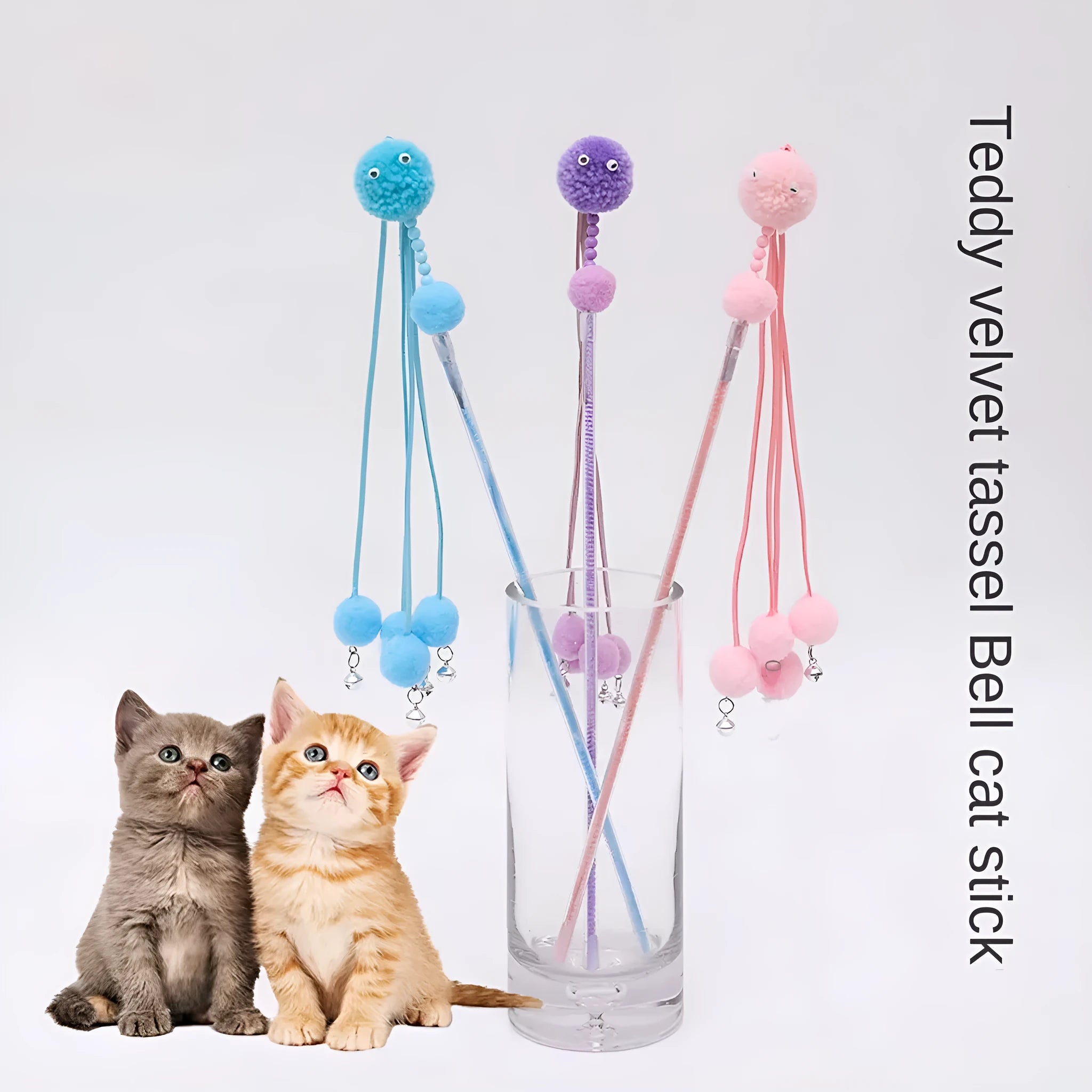 Pipitao funny cat stick toy with blue tassel on a carpet for pet play