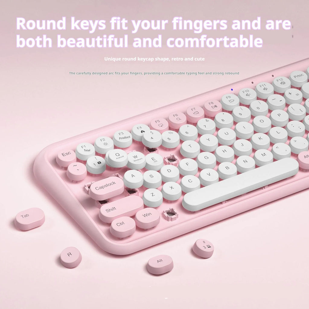 Pink portable Bluetooth keyboard with 84 keys showing crater architecture buttons