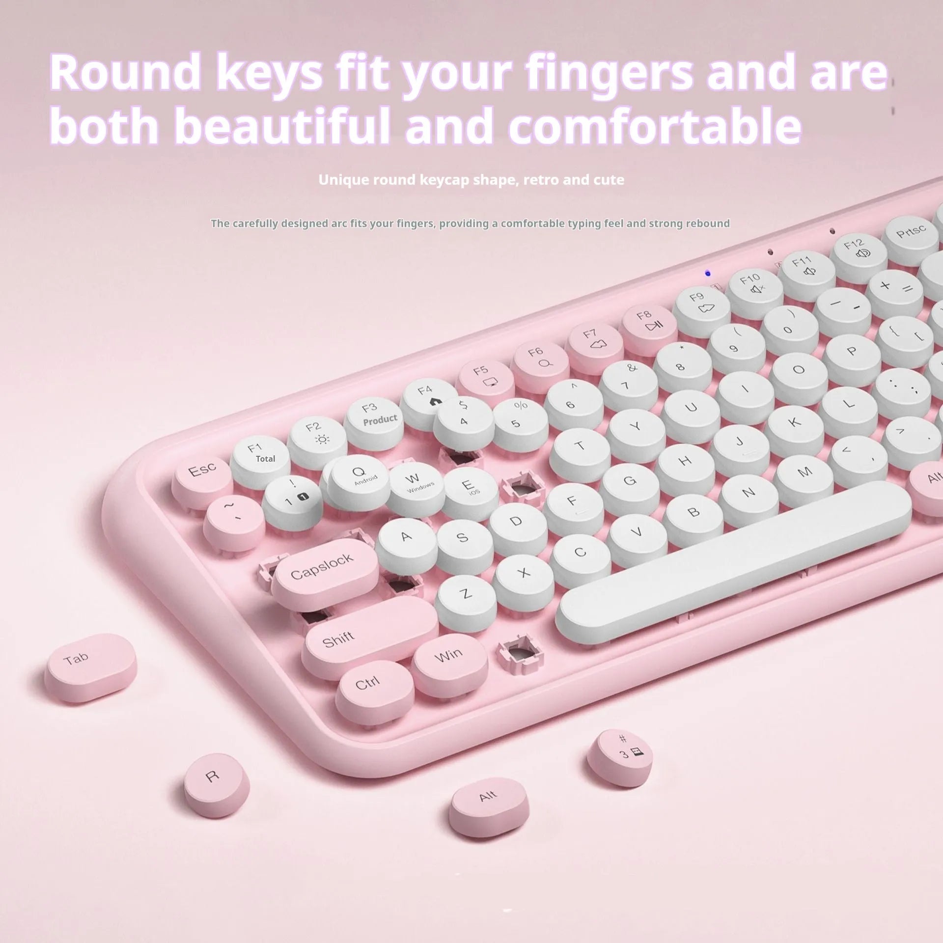 Pink portable Bluetooth keyboard with 84 keys showing crater architecture buttons