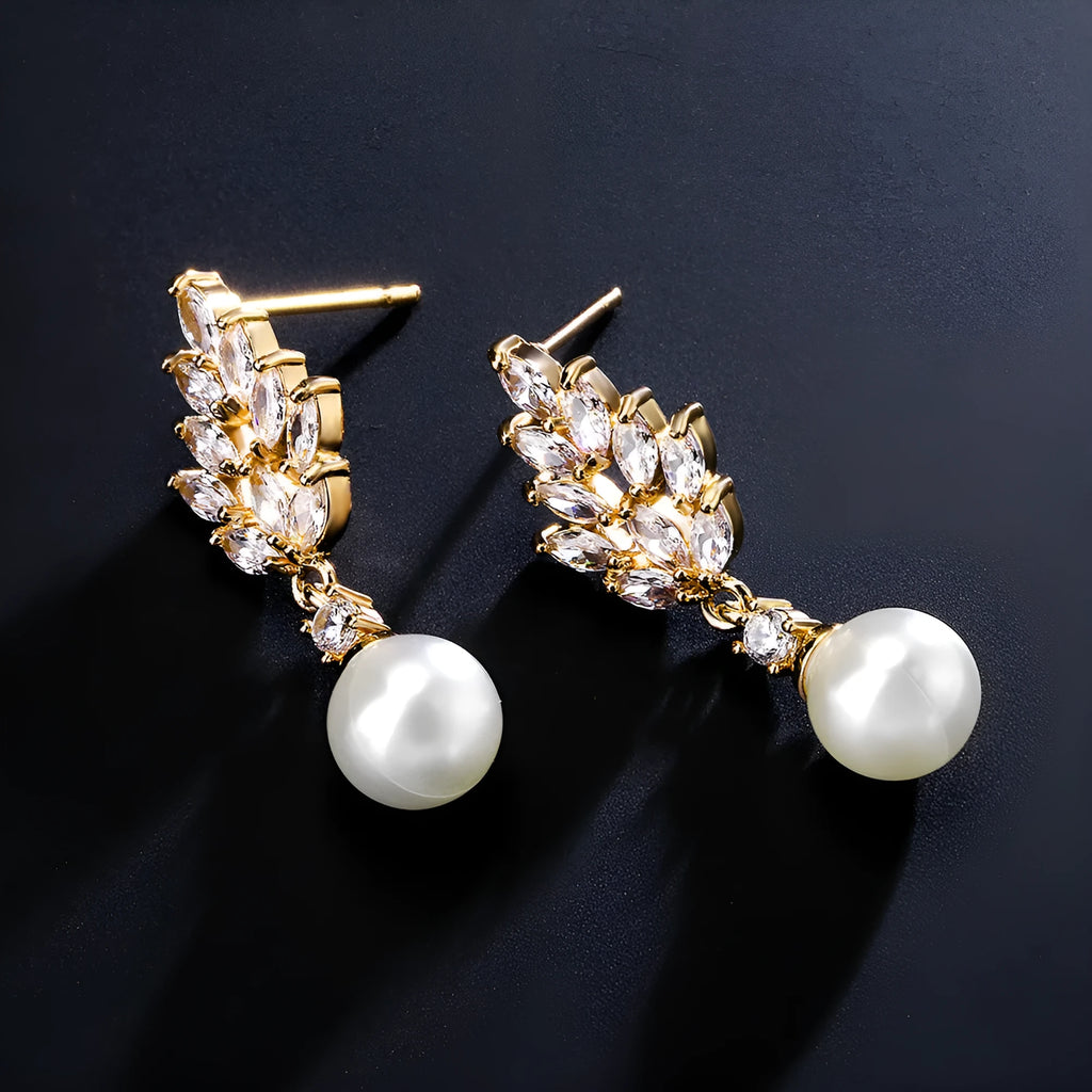 Geometric copper earrings with micro inlaid zircon and flower detail in gold plating