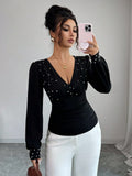 Women's solid colour bell sleeve t-shirt in black, v-neck, fitted polyester