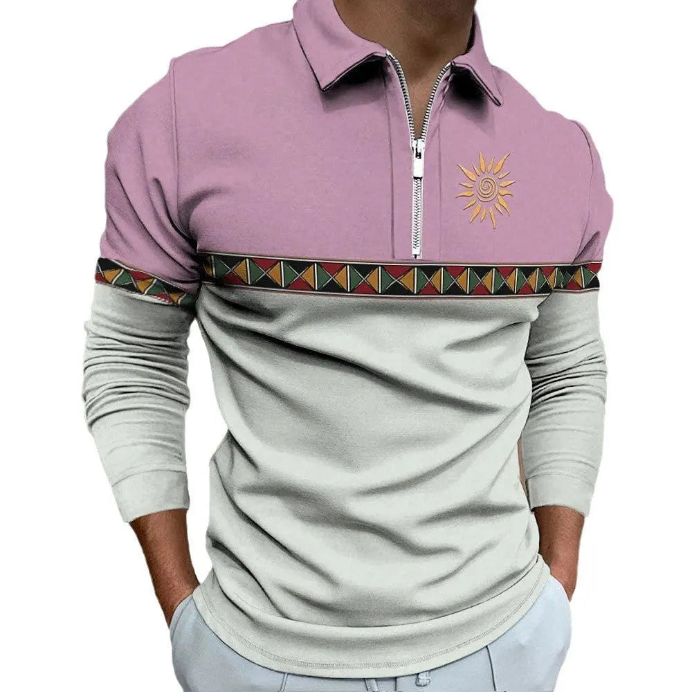 Man wearing a loose-fit long sleeve t-shirt with retro colour block printing and a decorative zipper detail.