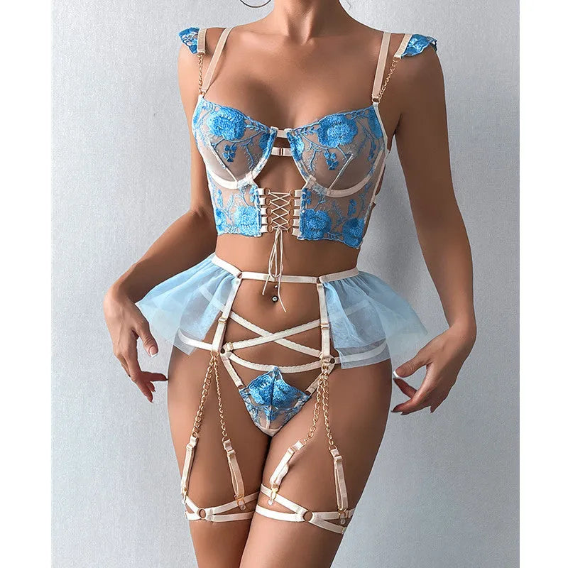 Light blue lace embroidered women's bra and pants set with transparent mesh design.