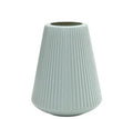 Colourful melamine plastic decorative flower vase on a desktop, 16cm wide by 20cm tall.