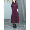 Purplish red women's plus size long sleeve dress with a long skirt for autumn and winter wear.
