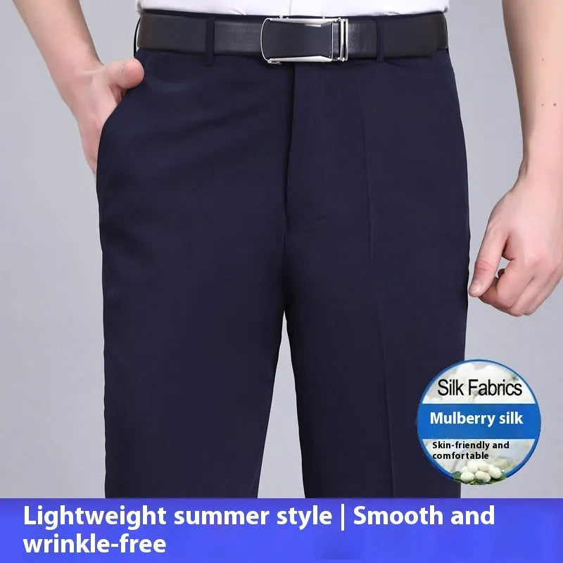 Men's straight-leg mulberry silk blend suit pants in dark blue on a hanger.