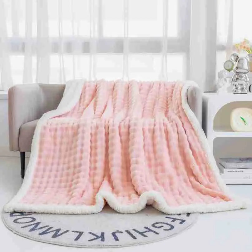 Bubble double layer thick lambskin blanket in beige on a sofa