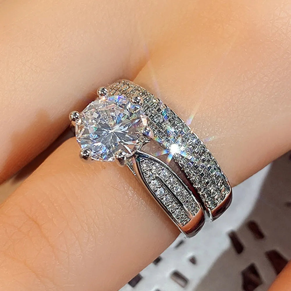 Geometric wedding bracelet ring in white gold colour alloy showing round design elements