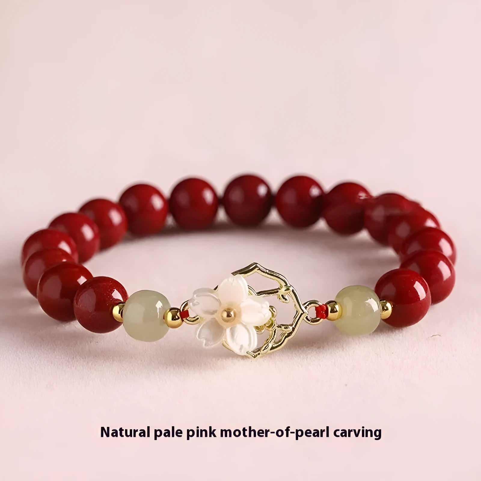Natural Hetian jade white butterfly Bells of Ireland sinology bracelet with cinnabar beads and lotus motif on women's wrist