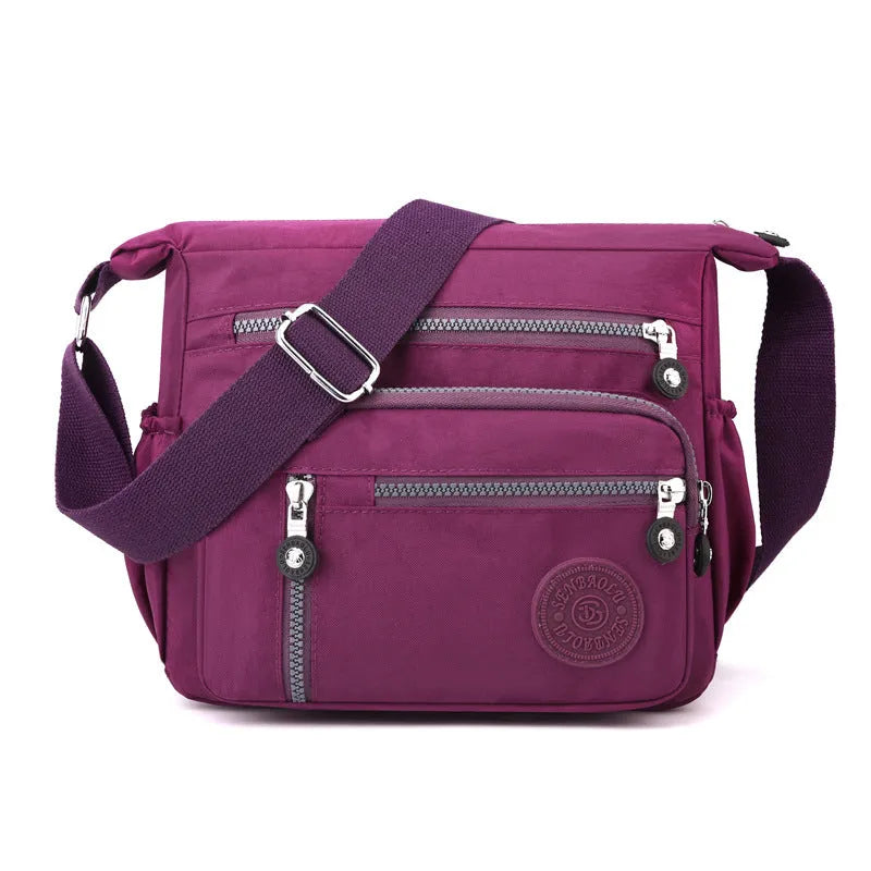 Nylon messenger bag with square vertical shape in one of five colour options