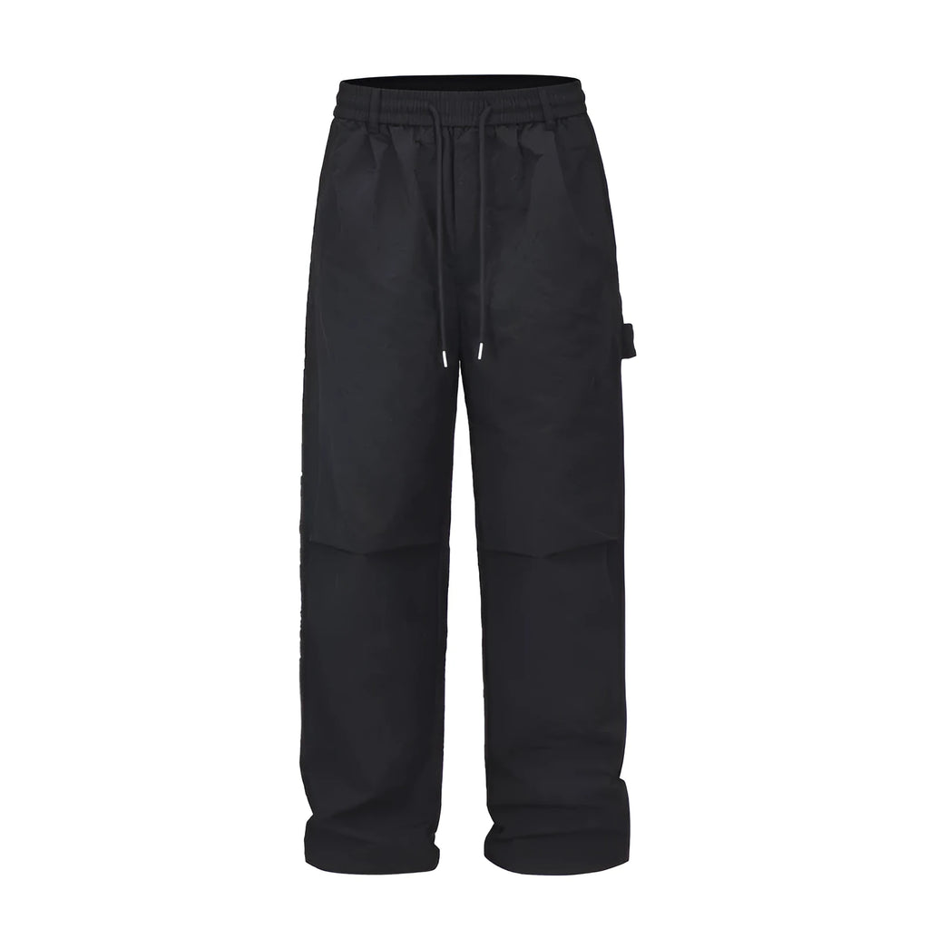 Men's black baggy paratrooper pants with elastic drawstring waist, three-dimensional cutting, acetate fibre blend