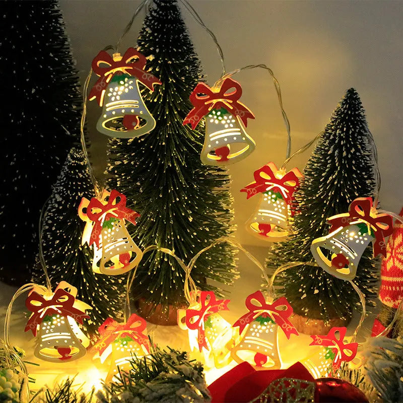 Christmas LED light string with Santa Claus, elk, and snowman ornaments on a dark background