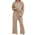 Women's solid colour rayon jacquard knit suit with long sleeve top and elastic waist cropped trousers.