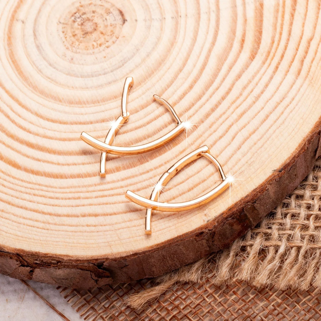 Rose gold copper cross shaped earrings with geometric design for pierced ears