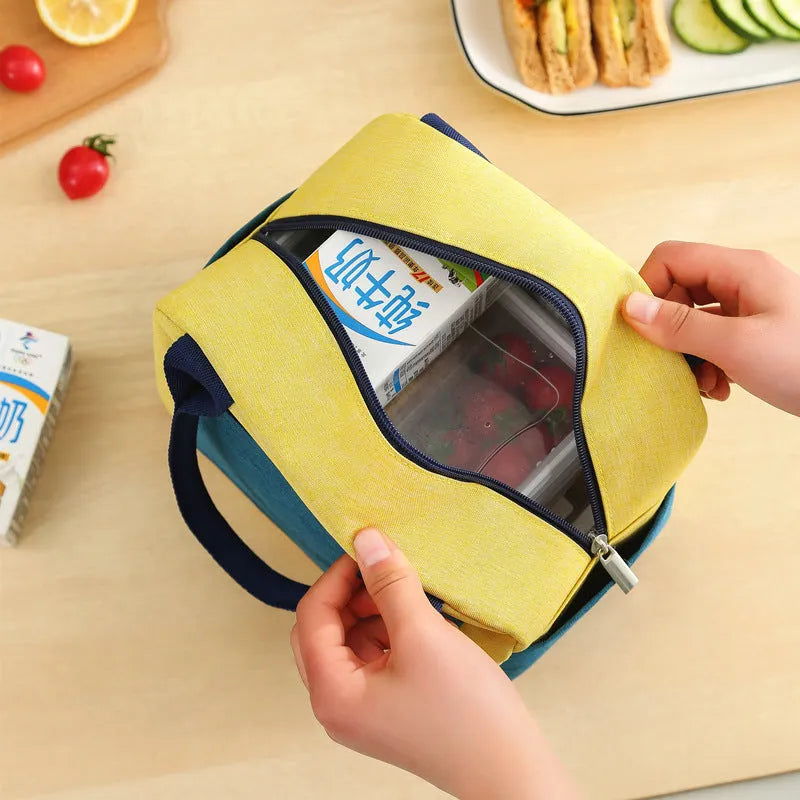 Multi-purpose insulated lunch bag in Oxford cloth with aluminium foil lining, available in blue, green beige, pink, and yellow green colours