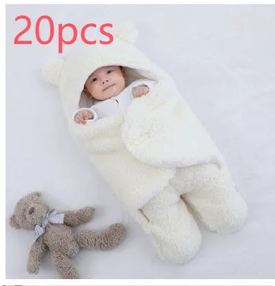 Baby quilted sleeping bag wrapper in cotton blend fabric with polyester cotton filling, shown in one of six colours