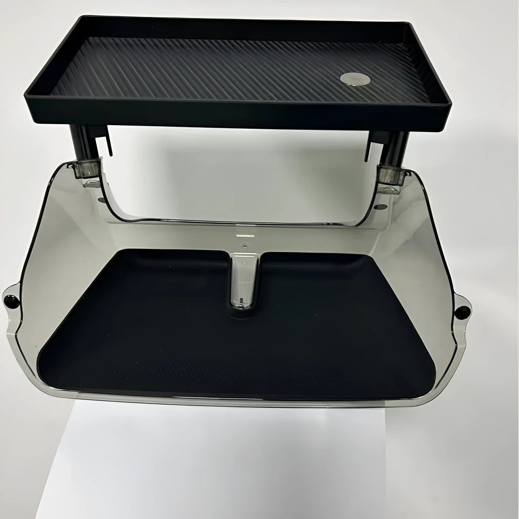 Black ABS storage box placed under Tesla Model 3 centre screen