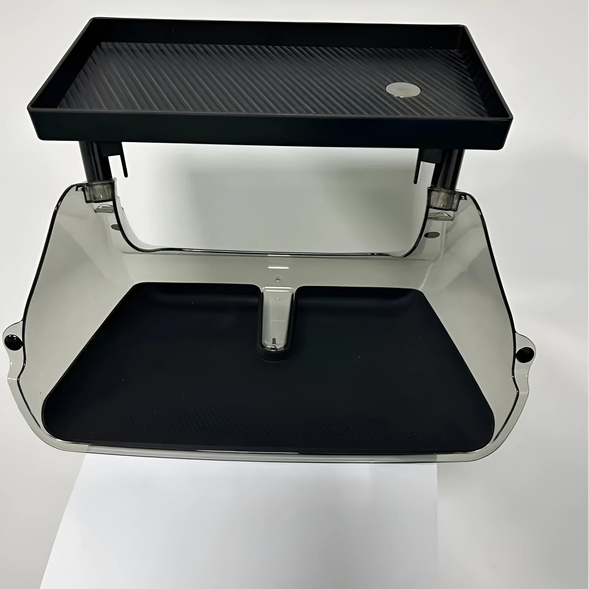 Black ABS storage box placed under Tesla Model 3 centre screen